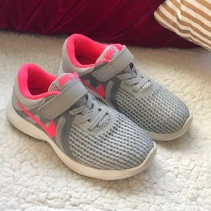 Girls Nike running shoes.